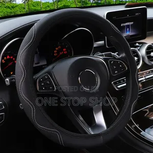 Leather/Suede Steering Wheel Cover With White Stitch Pattern