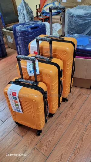 Orange 3-Piece Hard-Shell Luggage Sets