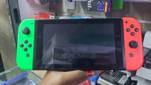 Nintendo Switch Used (Green and Red)