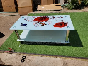 Classic Coffee Table With Red Flowers on Top
