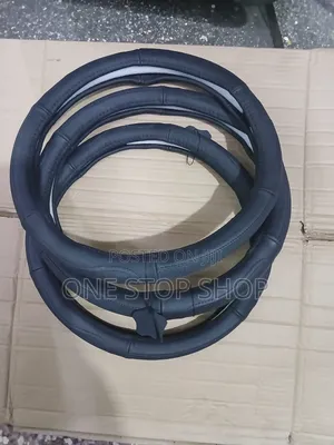 Black Leather Construction Durable,Antislip,Secure Grip Steering Cover