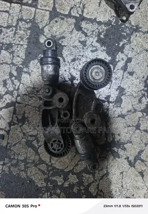 Mazda Demio Tensioner