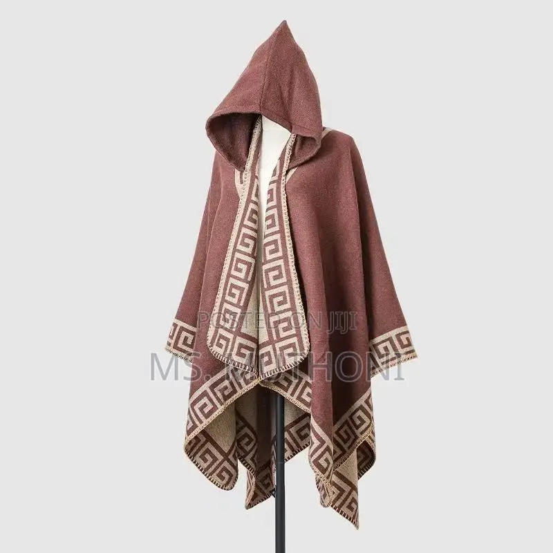 *Ladies Patterned Poncho With a Hood