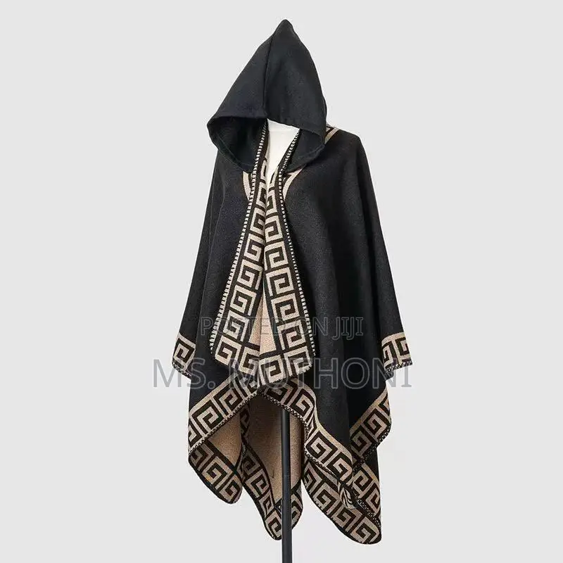 *Ladies Patterned Poncho With a Hood