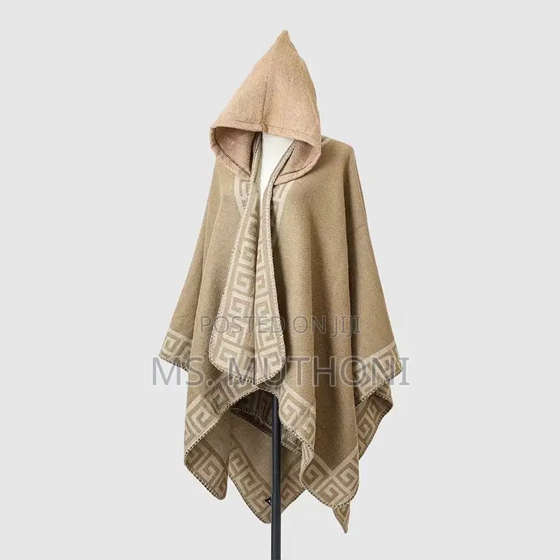 *Ladies Patterned Poncho With a Hood
