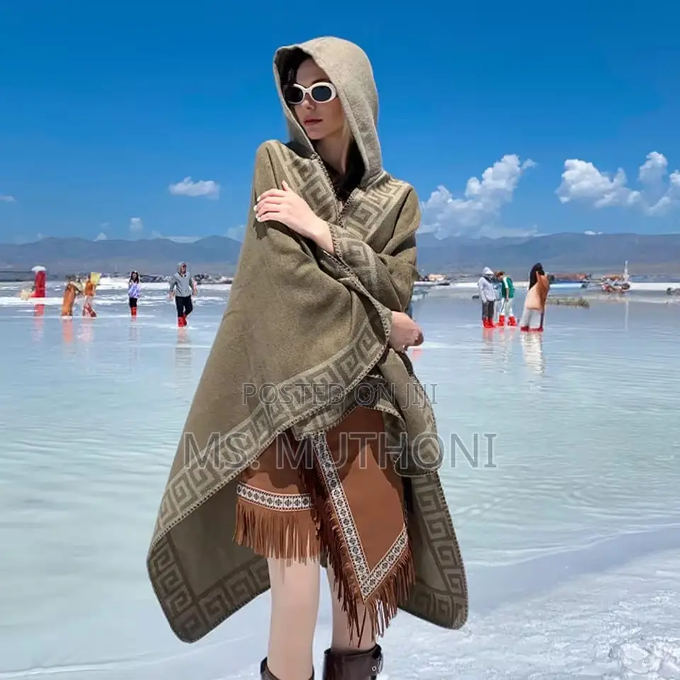 *Ladies Patterned Poncho With a Hood