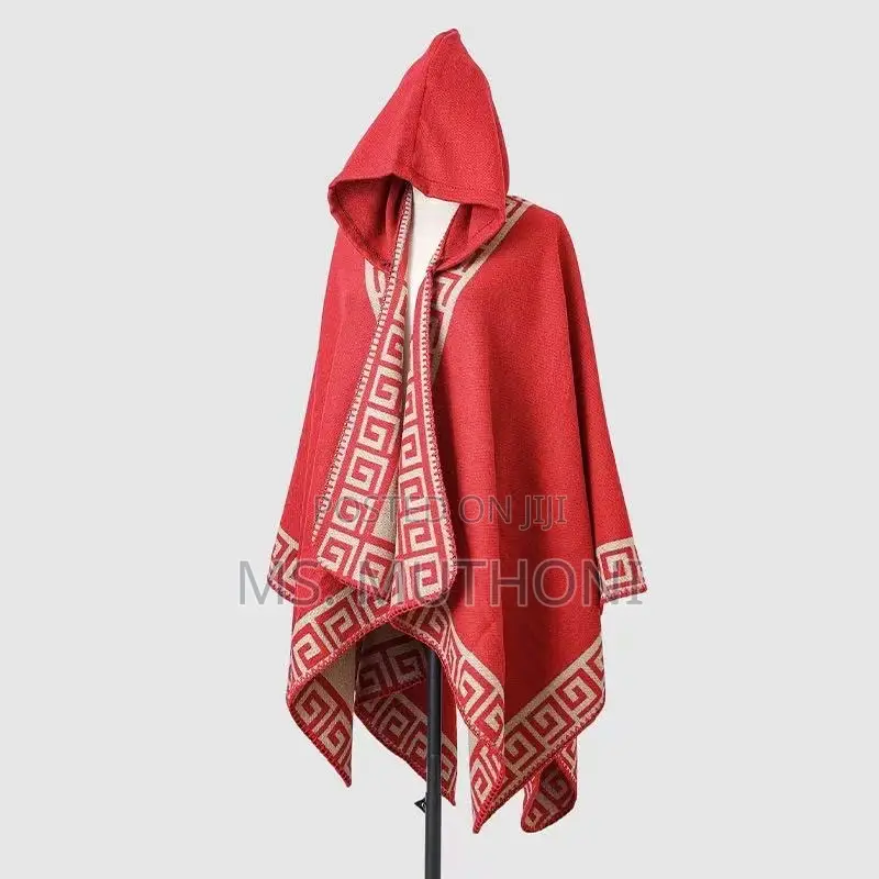 *Ladies Patterned Poncho With a Hood