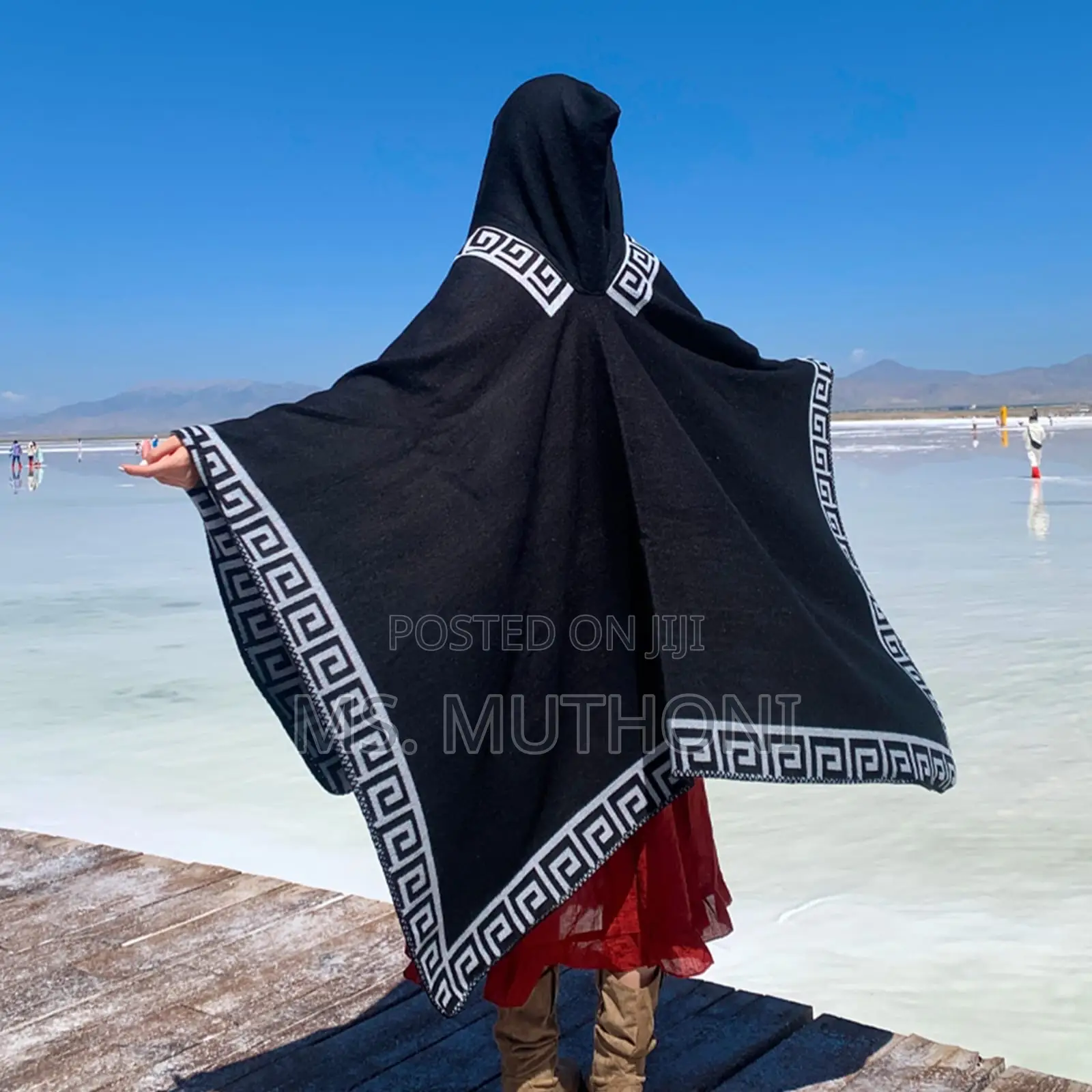 *Ladies Patterned Poncho With a Hood