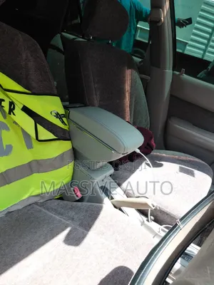 Grey Armrest Console Fitted on a Saloon Car/ Universal Armrest
