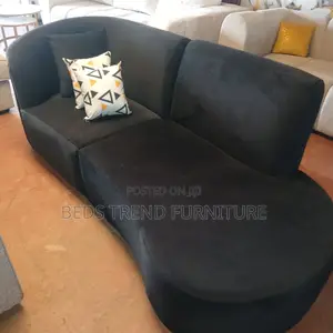 3 Seater Black Curved Sofa.