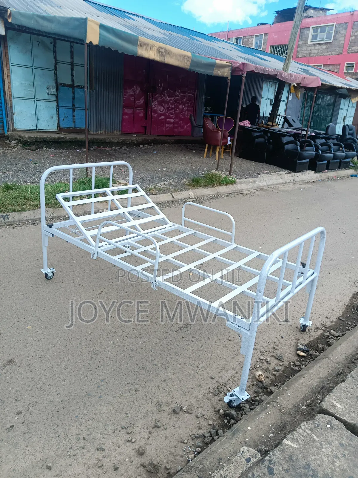 Hospital Bed With Caster Wheels and Coated White Frame
