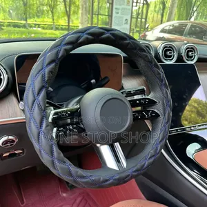 Diamond Quilted Leather Steering Wheel Cover With Blue Stitches