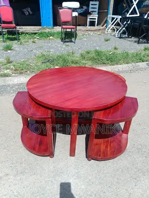 A Set of 1 Big Coffee Table and 4 Small Ones.