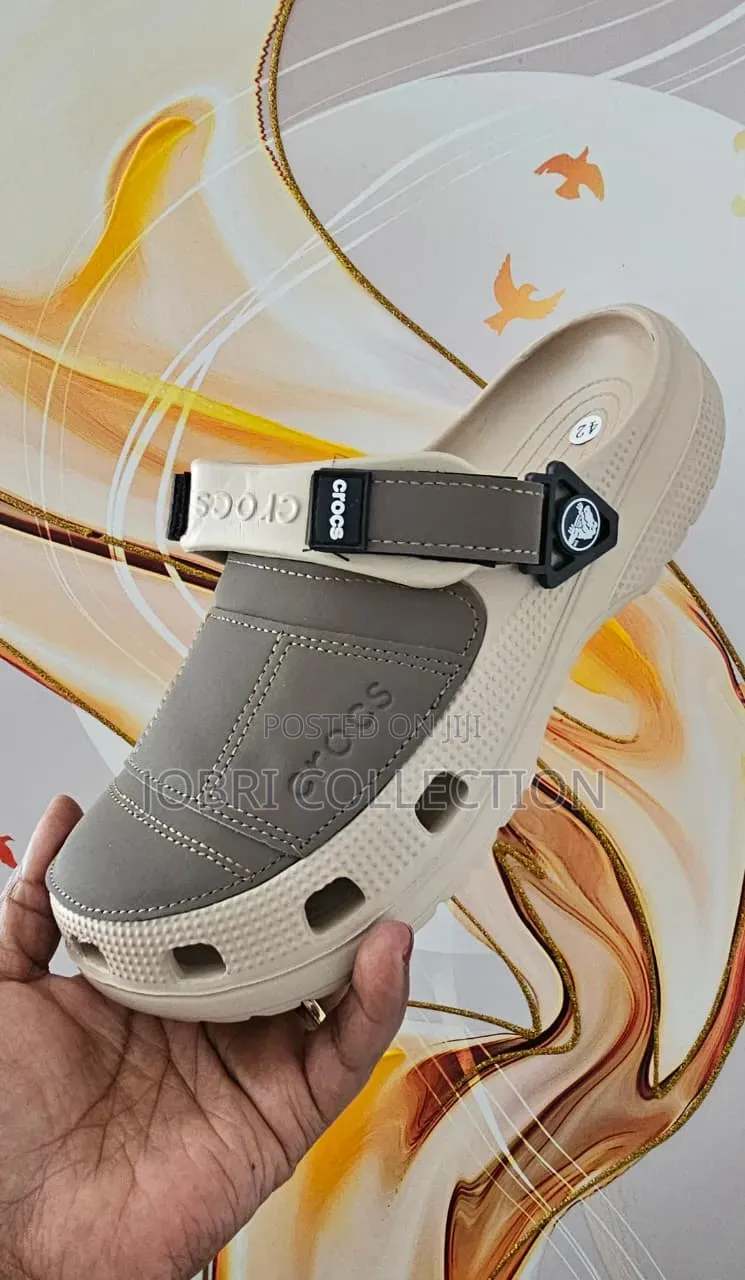 Beige Crocs Yukon Sandals
