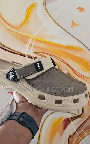 Beige Crocs Yukon Sandals