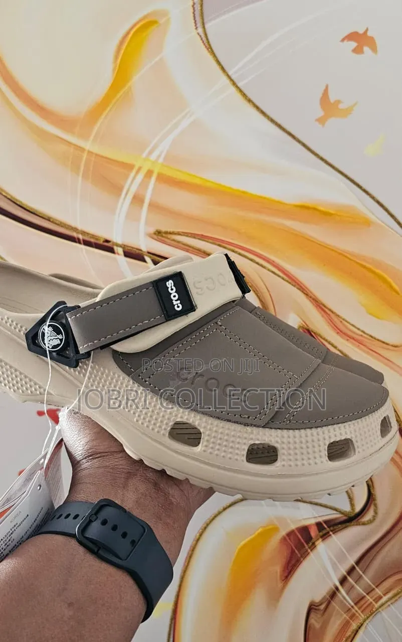Beige Crocs Yukon Sandals