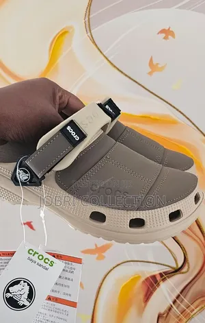 Beige Crocs Yukon Sandals