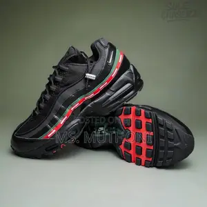 Undefeated X Nike Air Max 95 Sp Sneakers in a Black, Green, and Red
