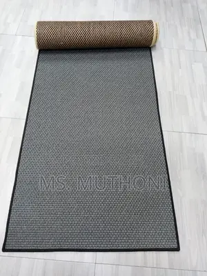 Solid Color Dirt Trapper Doormats Featuring a Non-Slip Backing.