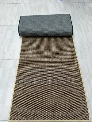 Solid Color Dirt Trapper Doormats Featuring a Non-Slip Backing.