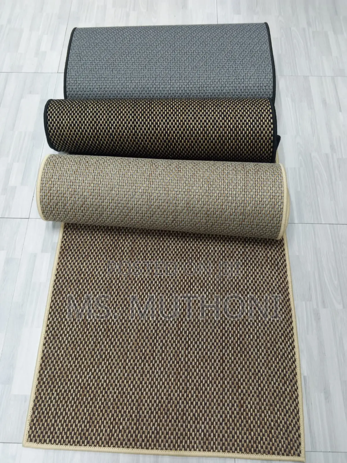 Solid Color Dirt Trapper Doormats Featuring a Non-Slip Backing.