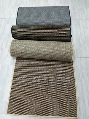 Solid Color Dirt Trapper Doormats Featuring a Non-Slip Backing.