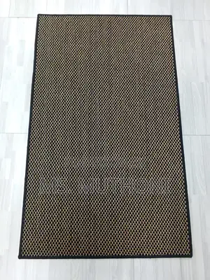 Solid Color Dirt Trapper Doormats Featuring a Non-Slip Backing.