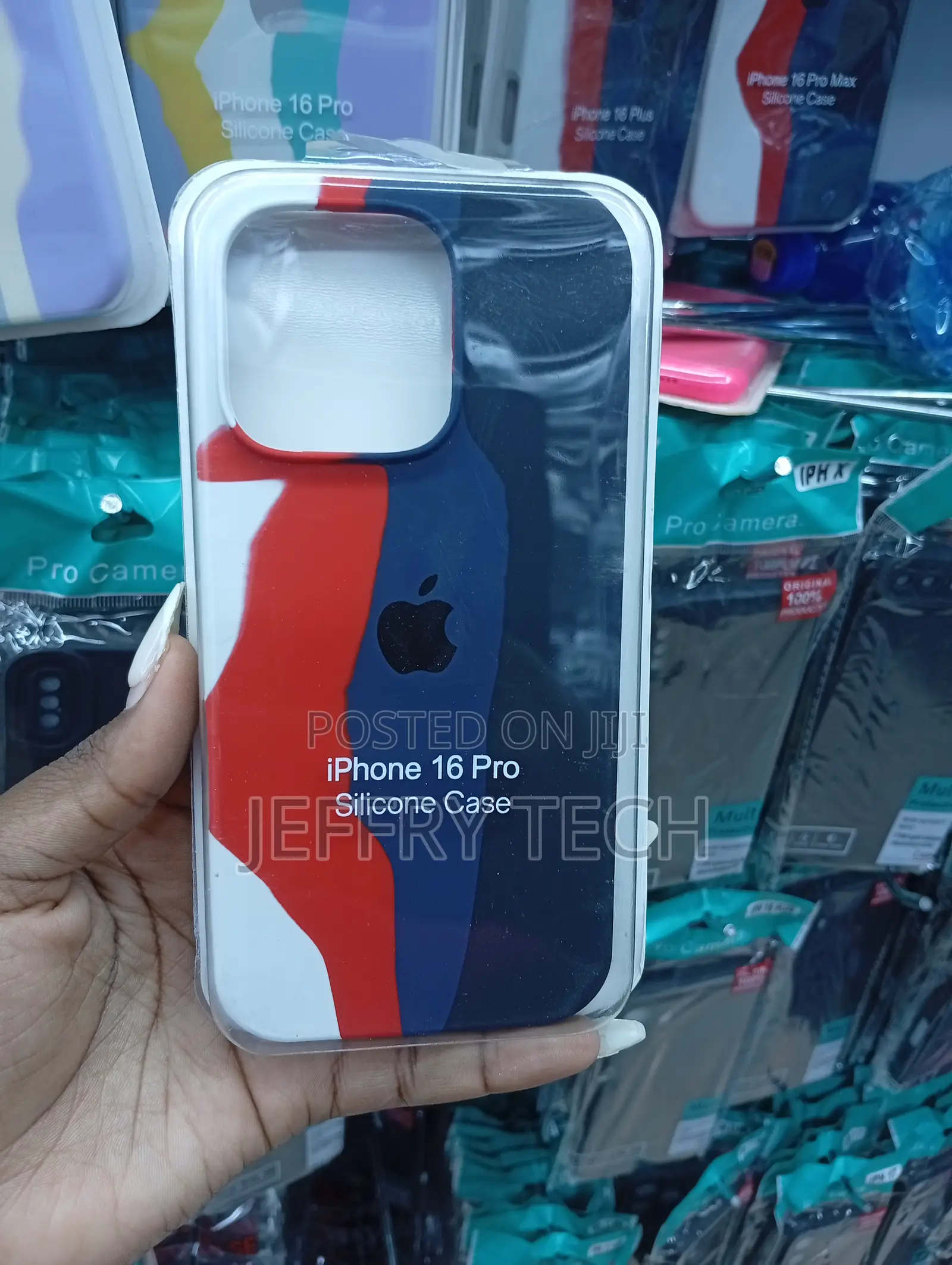 iPhone 16 Pro, Featuring a Tri-Color in Red, Blue, and White Case