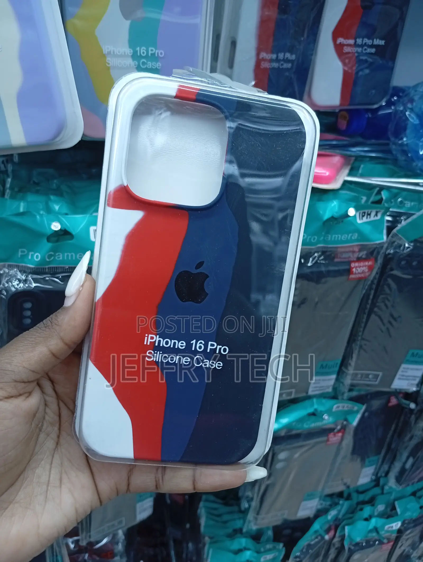 iPhone 16 Pro, Featuring a Tri-Color in Red, Blue, and White Case
