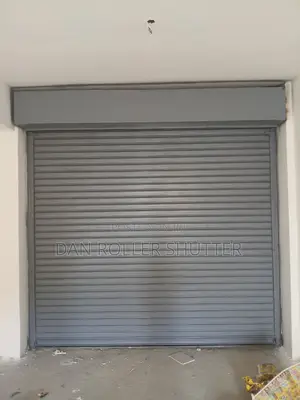 124. Motorized Commercial Entry Door –