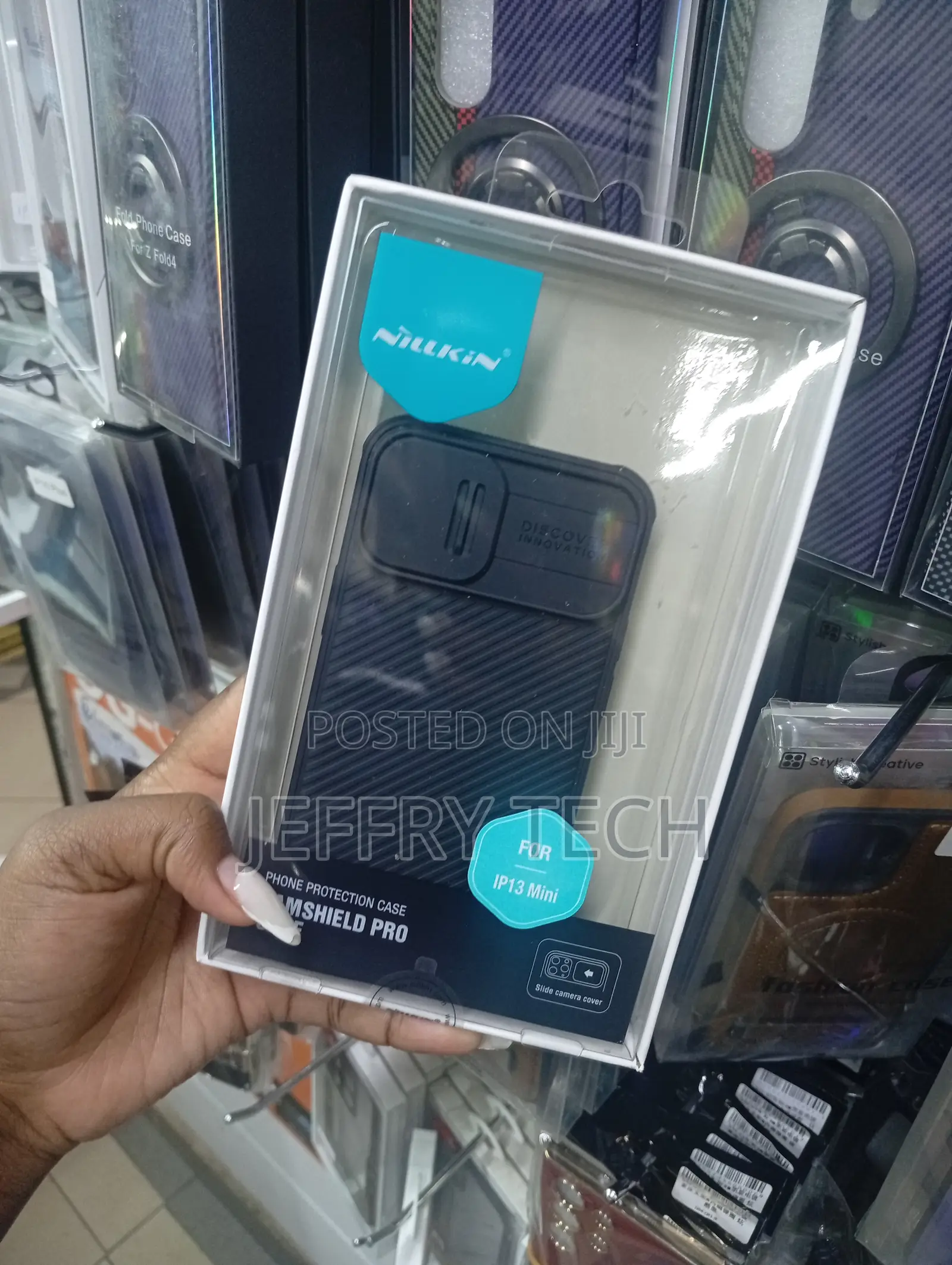 iPhone 13 Mini in Black Hybrid Case