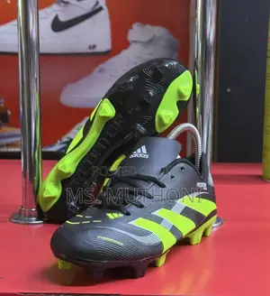 Kids Black and Neon Green Adidas Predator Soccer Cleats. (Size 30-40)