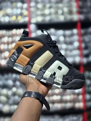 Nike Air More Uptempo Low Sneakers in a Black and Gum Medium Brown