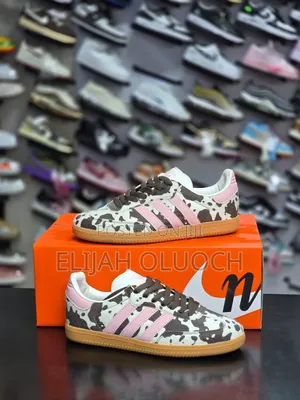 Adidas Samba Og Cow Print Sneakers in Dark Brown, White, and Pink.