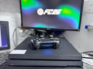 Black Playstation 4 Slim Chipped With Fc26 and Other Latest Games
