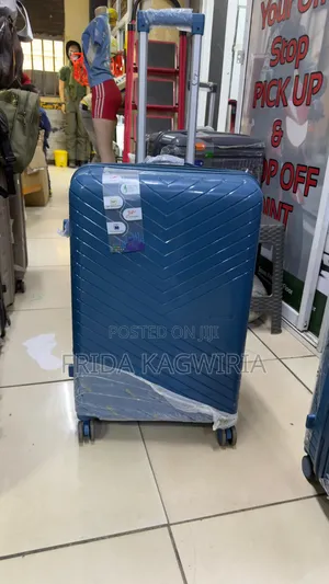 Medium Rubber Suitcase 
Height 66cm