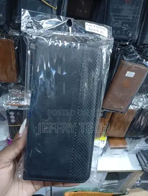 Black Faux-Leather Wallet Case for a Tecno Spark 40 Smartphone.
