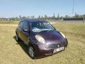 Nissan March 2003 Maroon