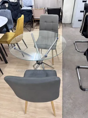 Grey Chairs Round Transparent Tables