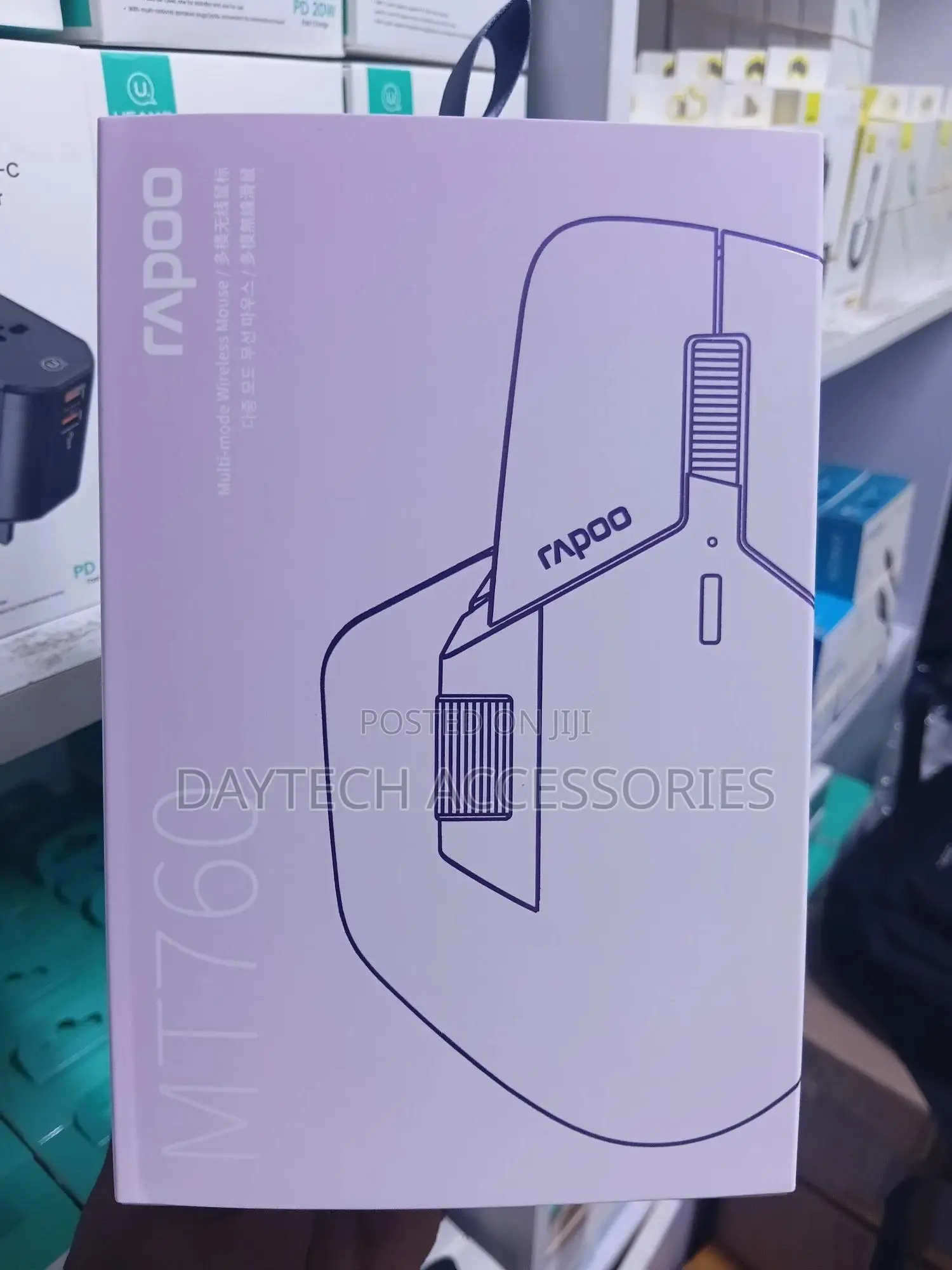 Rapoo Mt760l Multi-Device Wireless Mouse in White Packaging.