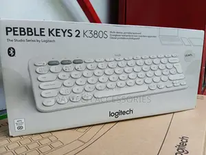 Logitech Pebble Keys 2 K380s Portable Bluetooth Keyboard in Off-White.