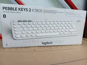 Logitech Pebble Keys 2 K380s Portable Bluetooth Keyboard in Off-White.
