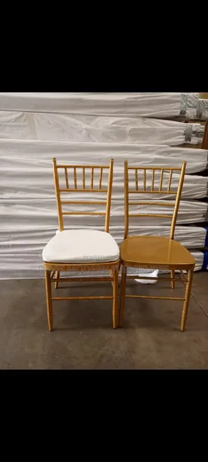 Two Gold Chiavari With Ladder Back Chairs