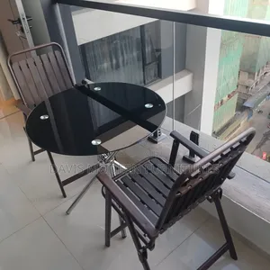 3-Piece Round Glass Bistro Set With Folding Metal Chairs