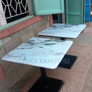 White Eboxy Tables With Hooks to Hang Handbags