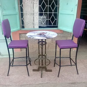 Two Purple Curved Restaurant Chairs With Table