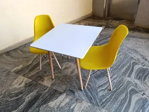 Seater Yellow Eames Chair and White Dinning Table