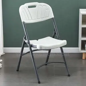 Office Chair : White Plastic Folding Chair With a Gray Metal Frame.
