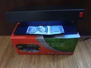 Money Detector Reveals Watermark On Genuine Bank Notes