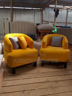 Vibrant Yellow Armchairs With Houndstooth Cushions